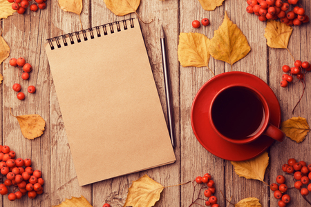 Red cup of coffee on grey wooden background, top view, copy spaceの写真素材