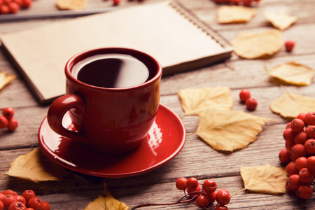 Red cup of coffee on grey wooden background, top view, copy spaceの写真素材