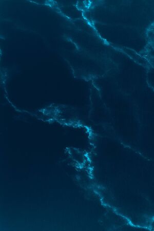Dark blue marble texture background, pattern for gadget case or coverの写真素材
