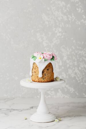 Easter cake on the stand on grey background. Holiday background, copy spaceの写真素材