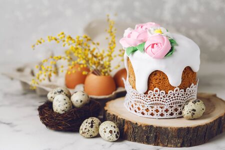 Easter rustic composition with quail eggs in the nest. Holiday background. Copy spaceの写真素材