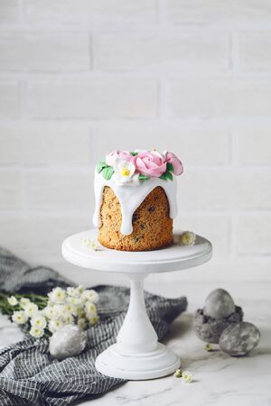 Easter inspiration. Cake on stand on marble table. Holiday backgroundの写真素材