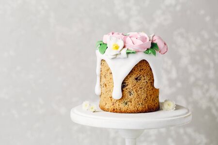 Easter cake on the stand on grey background. Holiday background, copy spaceの写真素材