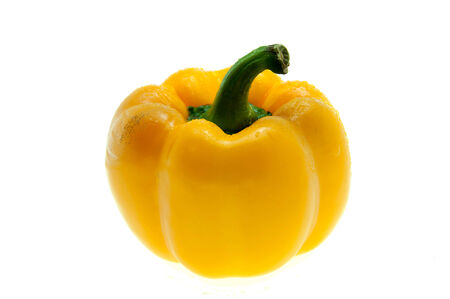 sweet yellow pepper isolated on white backgroundの写真素材