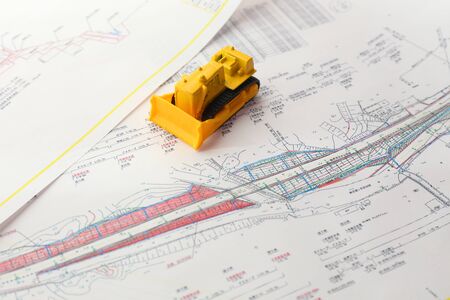Toy Bulldozers and Drawingsの写真素材