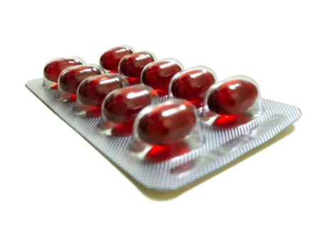 red pill in pack isolated on a white background.