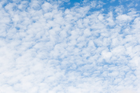 Blue sky with white clouds backgroundの写真素材