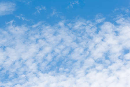 Blue sky with white clouds backgroundの写真素材