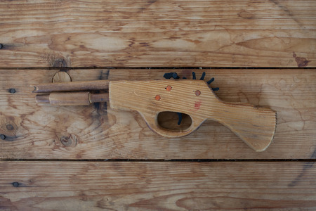 Toy wooden gunの写真素材