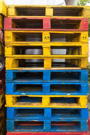 background of colorful wooden cargo palletsの写真素材