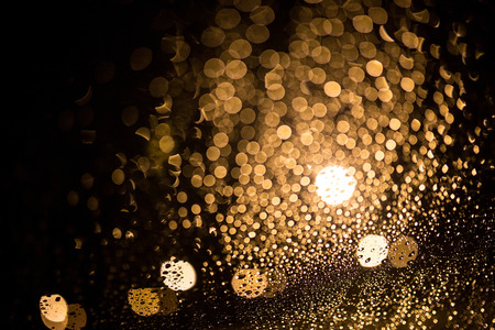 Decorative neon lights in soft focus, rainingの写真素材