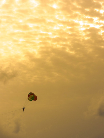 extreme Parachute on the golden sky at afternoon. outdoor photo.の写真素材