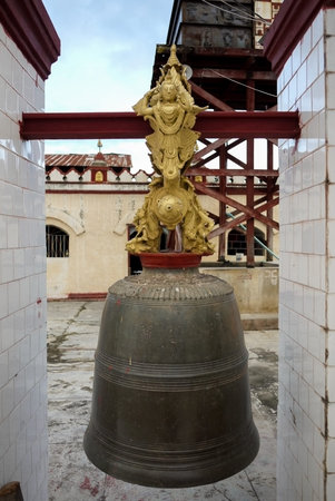 Ancient bell in a pagoda in Myanmarの写真素材