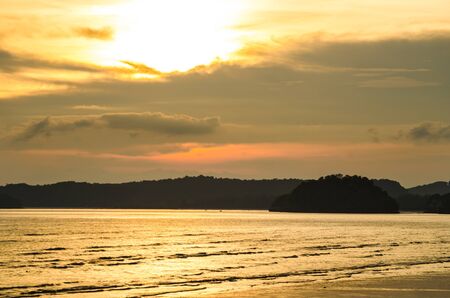 Sun set at a beach in Southern Thailandの写真素材