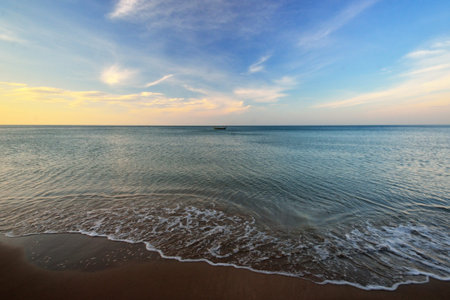 Sand beach of Thailand and horizon over waterの写真素材