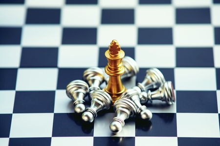 Chess board game, gold and silver team, business competitive conceptの写真素材