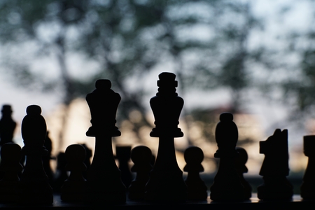 Chess board game, encounter difficult situation, business competitive concept, copy spaceの写真素材