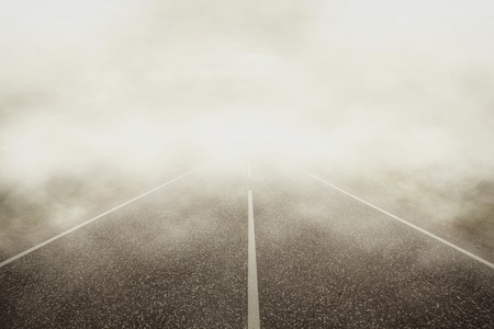 The road in dense fogの写真素材