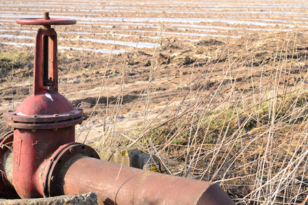 Abstract image look for designers with red iron waterpipe construction with rustの写真素材