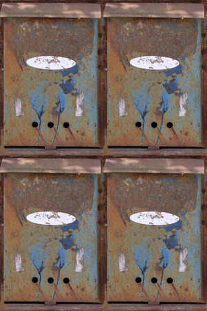 Abstract seamless pattern for designers with postbox stack from rusty metal sheetsの写真素材