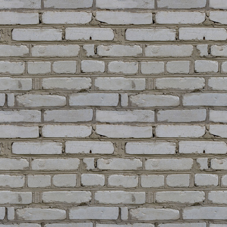 Abstract seamless pattern for designers with old masonry wall with fragments of cement and concrete bricksの写真素材