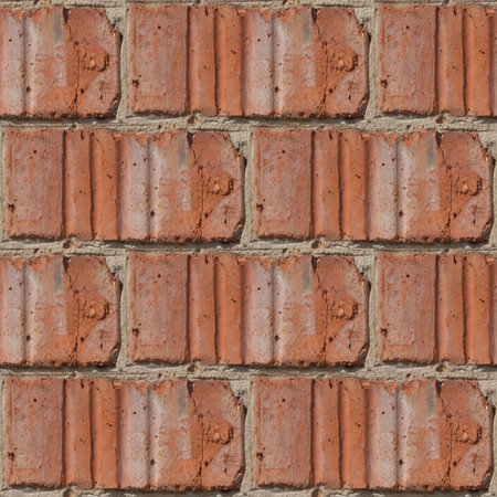 Seamless pattern for artists or designers of red brick wall with fragment of ciment and little stones between tilesの写真素材