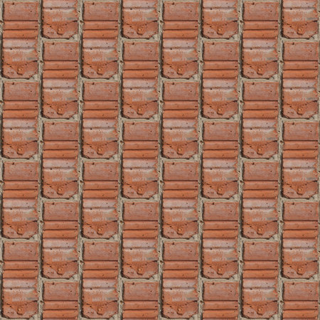 Seamless pattern for artists or designers of red brick wall with fragment of ciment and little stones between tilesの写真素材