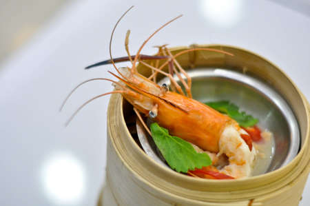 Chinese steamed dimsum in bamboo containers traditional cuisine の写真素材