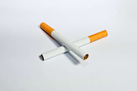 Smoking several cigarettesの写真素材