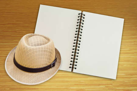 Notebook and the hat for Tourist