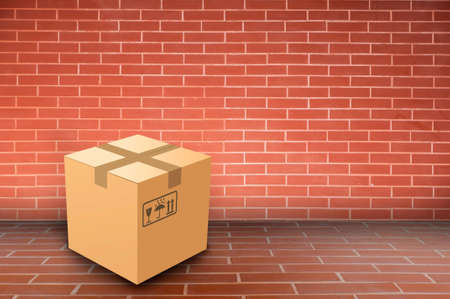 Box on brick wallの写真素材