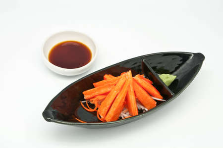imitation crabmeat and wasabi on white backgroundの写真素材