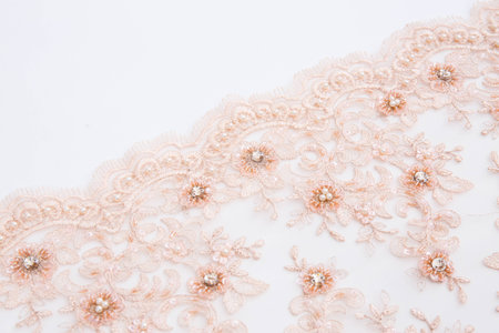 pink lace cloth on white backgroundの写真素材