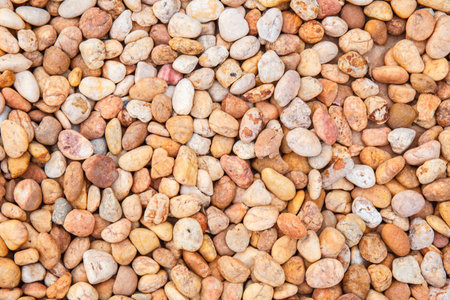 white and orange pebbles background