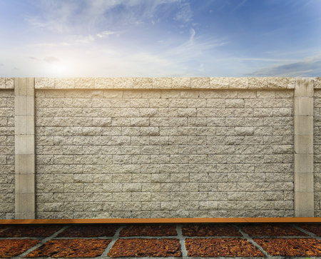 fence Brick wall and skyの写真素材
