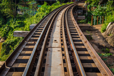 Railroad track curve around a bendの写真素材