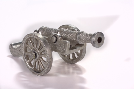 Silver Cannon Figurine isolated on white