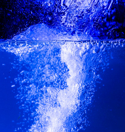 Sparkling bubbles in splashing water.の写真素材