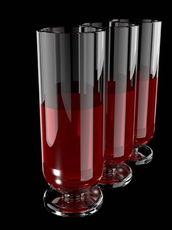 Glasses with red wine on black bacgroundの写真素材