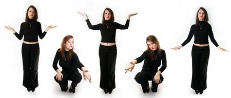 Young woman stands and he gesticulates by  hands the white backgroundの写真素材