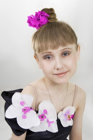 Portrait of the young dancer to a white backgroundの写真素材