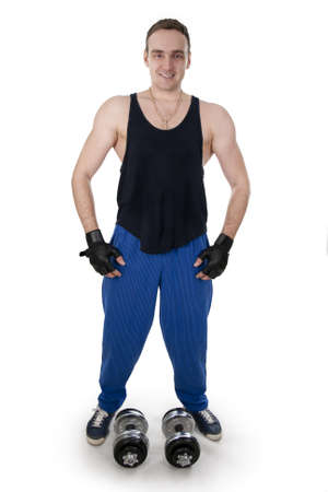 Healthy muscular bodybuilder exercising with dumbbels.White isolated.の写真素材