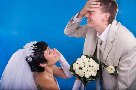 The groom and the bride in a conflict situationの写真素材