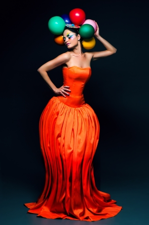 Fashion girl with balloonの写真素材