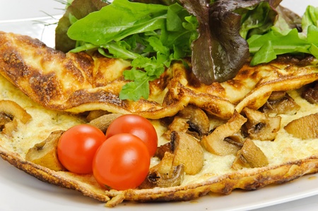 Casserole with mushrooms and tomatoes
