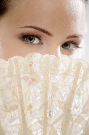 beautiful woman with a fanの写真素材