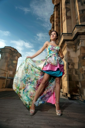 Fashion portrait of young attractive brunette outdoorの写真素材