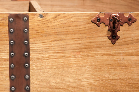 Old Brown wooden Casket with metal forging lockの写真素材