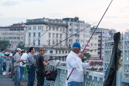 Fishermen on Galata Bridge of Istanbulのeditorial素材