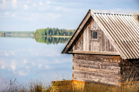 Wooden country house on lake shoreのeditorial素材